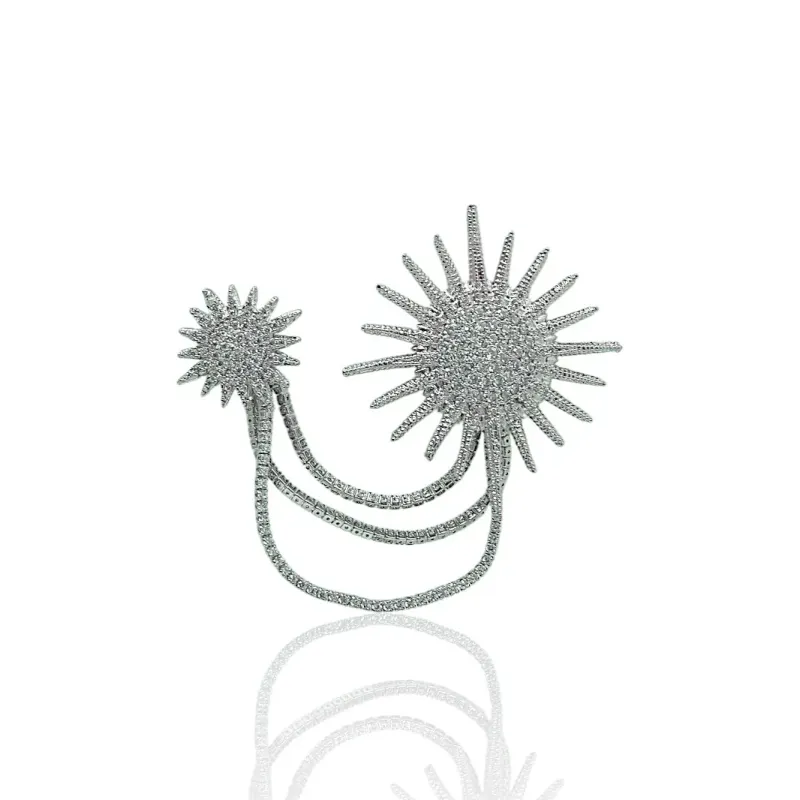 BROCHE DOIS METEOROS CRAVEJADOS COM RIVIEIRA